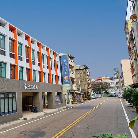 Yung An Business Hotel Dounan Bagian luar foto
