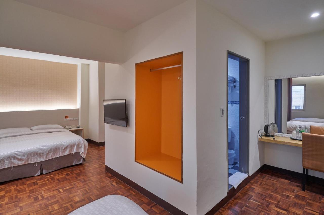 Yung An Business Hotel Dounan Bagian luar foto