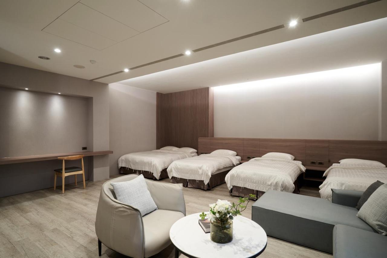 Yung An Business Hotel Dounan Bagian luar foto