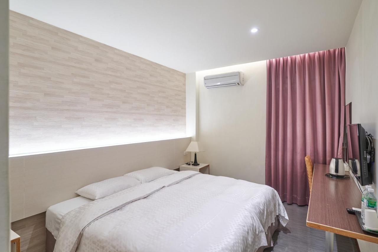 Yung An Business Hotel Dounan Bagian luar foto
