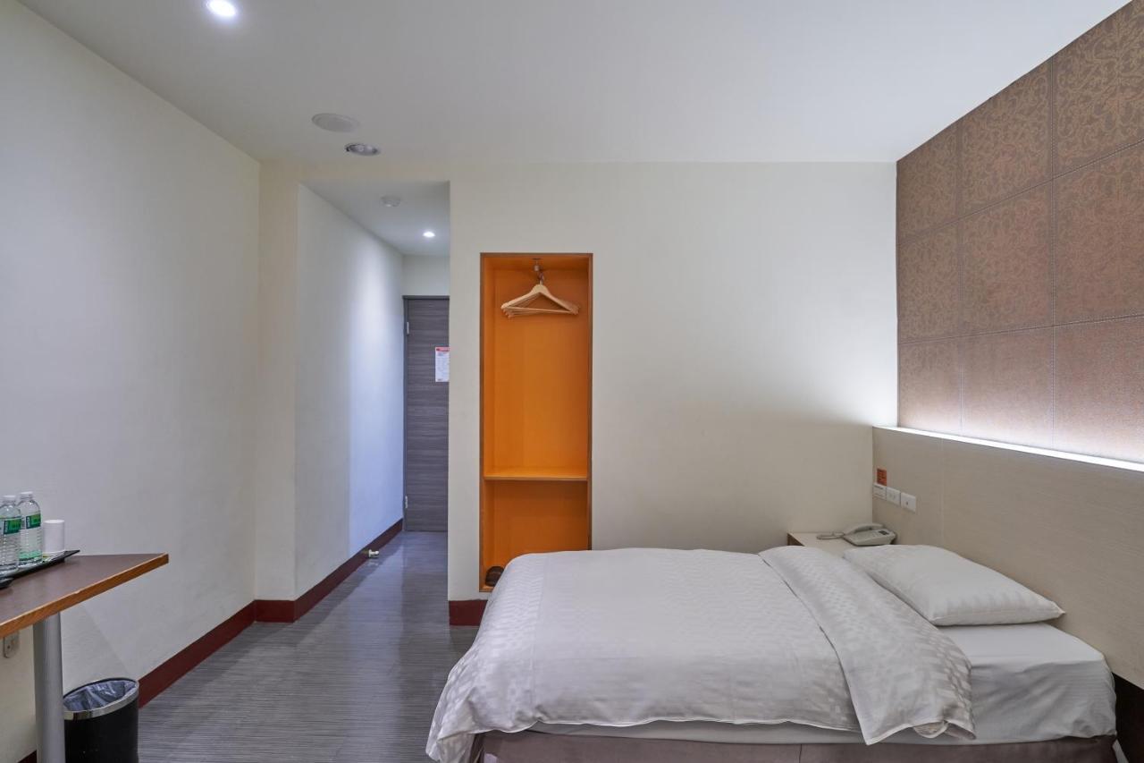 Yung An Business Hotel Dounan Bagian luar foto
