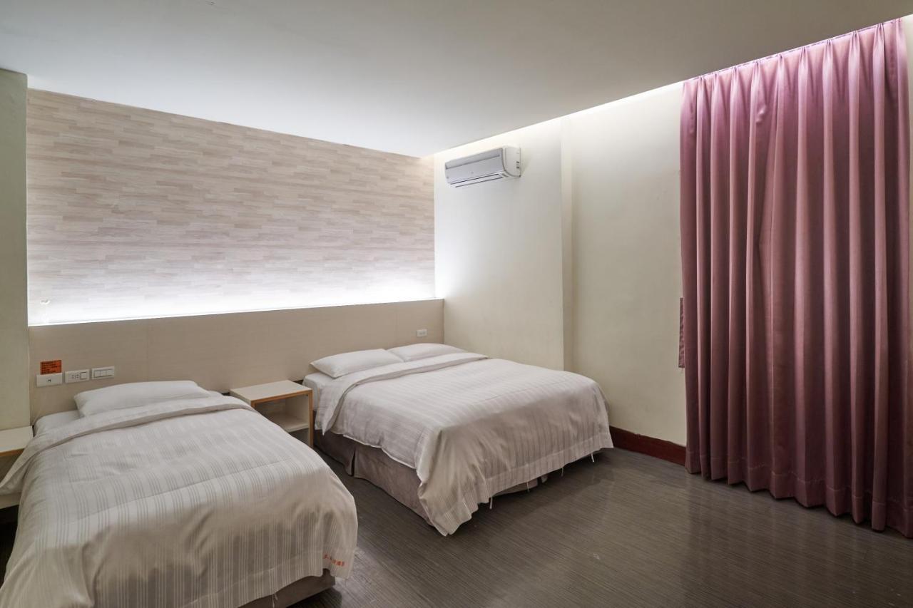 Yung An Business Hotel Dounan Bagian luar foto