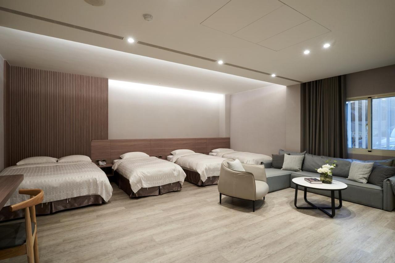 Yung An Business Hotel Dounan Bagian luar foto