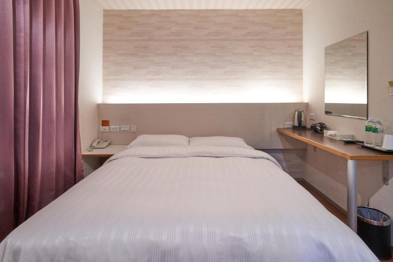 Yung An Business Hotel Dounan Bagian luar foto