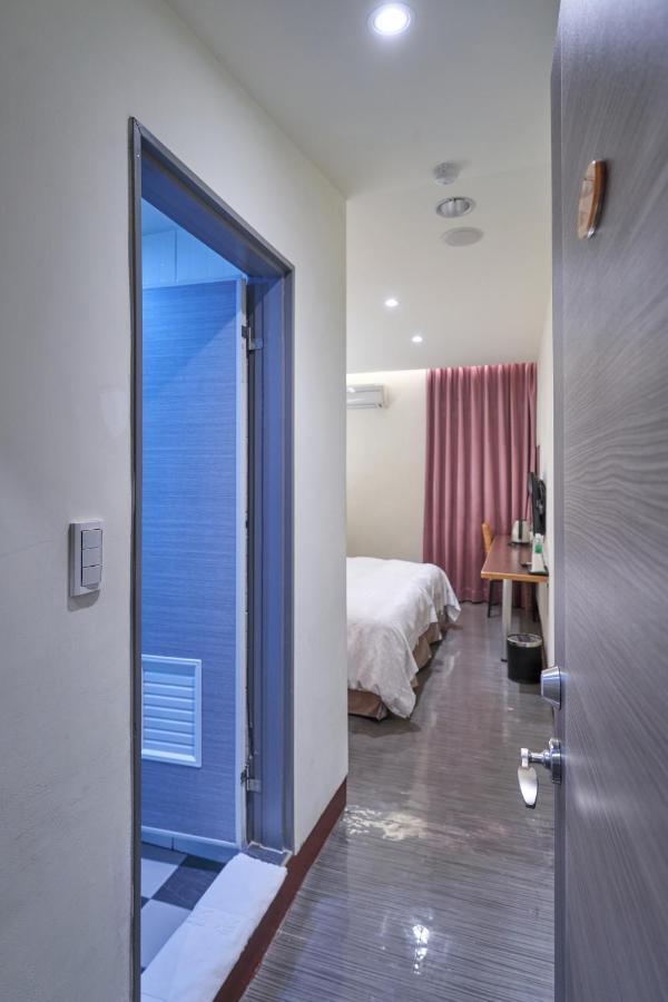 Yung An Business Hotel Dounan Bagian luar foto
