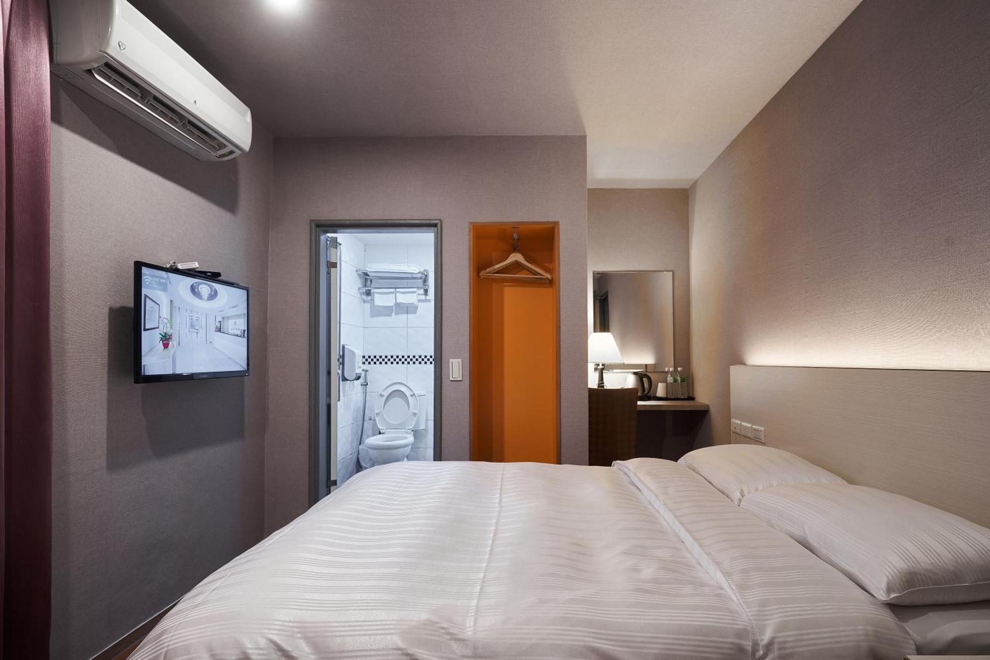 Yung An Business Hotel Dounan Bagian luar foto